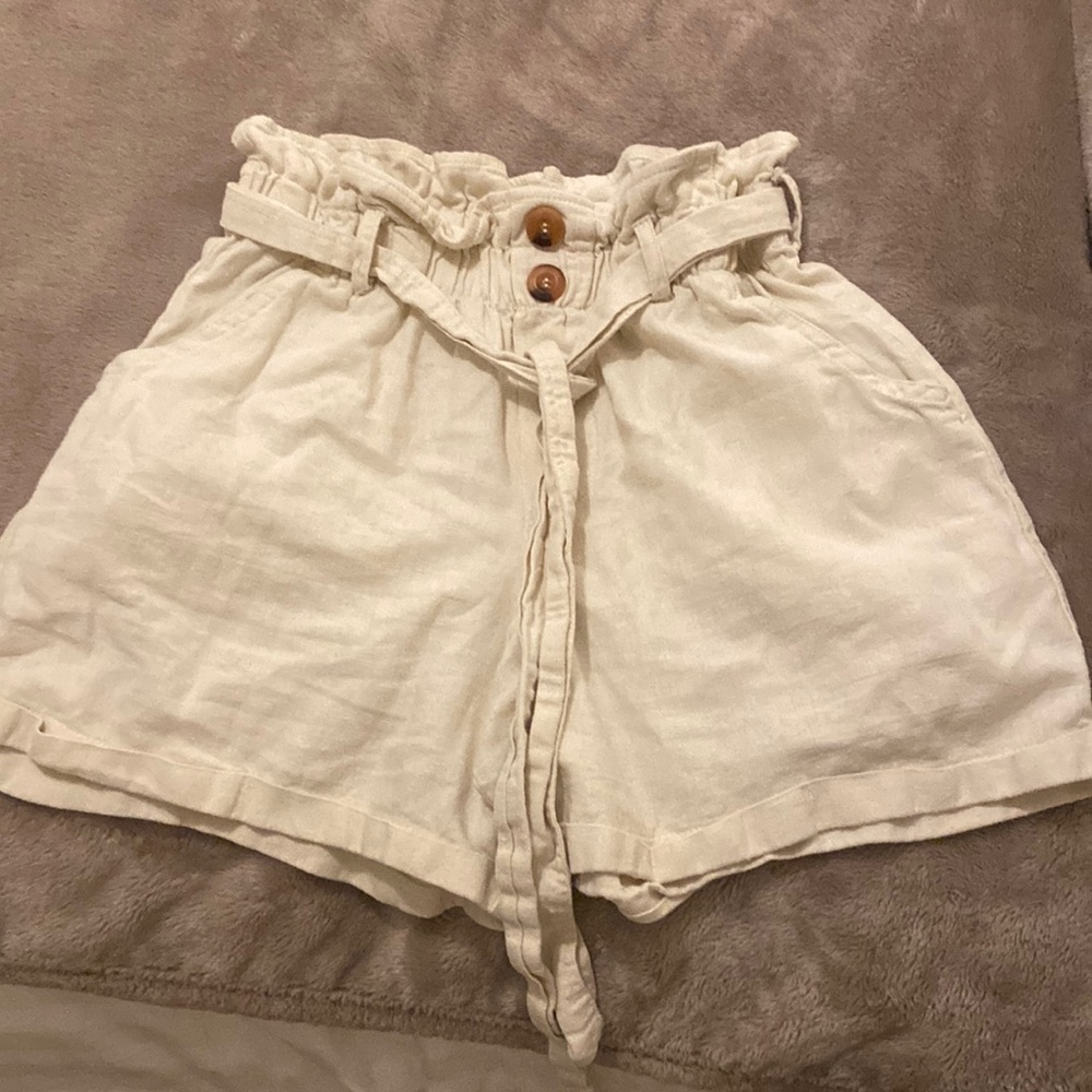 Cute Boho shorts cream color with tie in front.